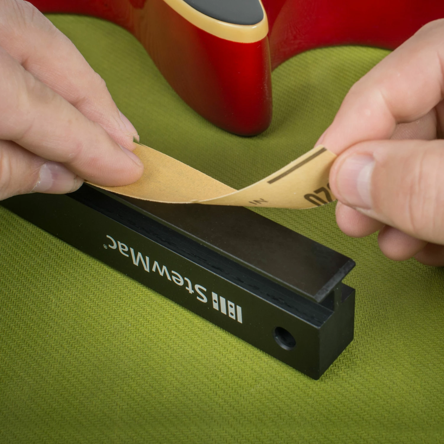 StewMac Fretbar Understring Leveler - StewMac StewMac Fretbar Understring Leveler - StewMac -US Tool Sales Shop 4641 5 putting on sandpaper 3000 scaled